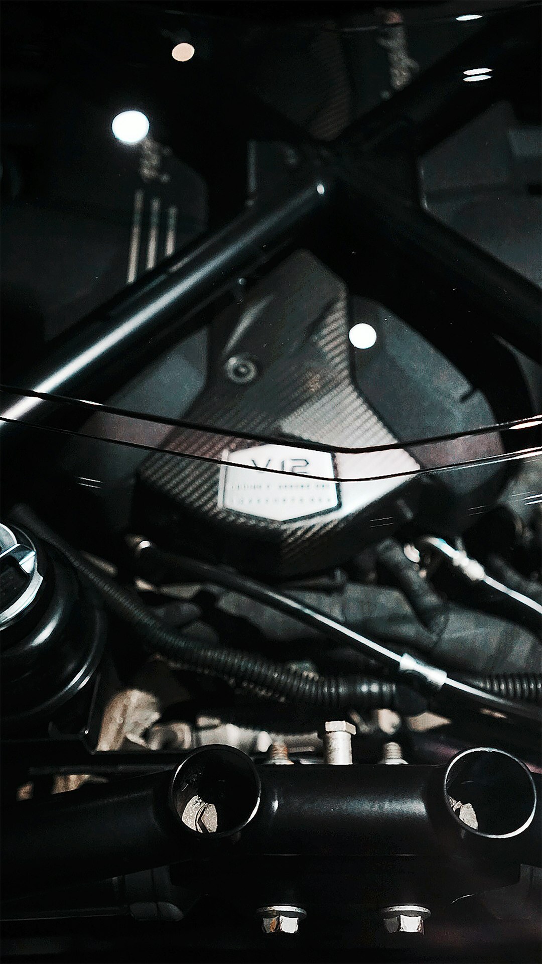 Close up of a high performance engine bay with exposed carbon fiber