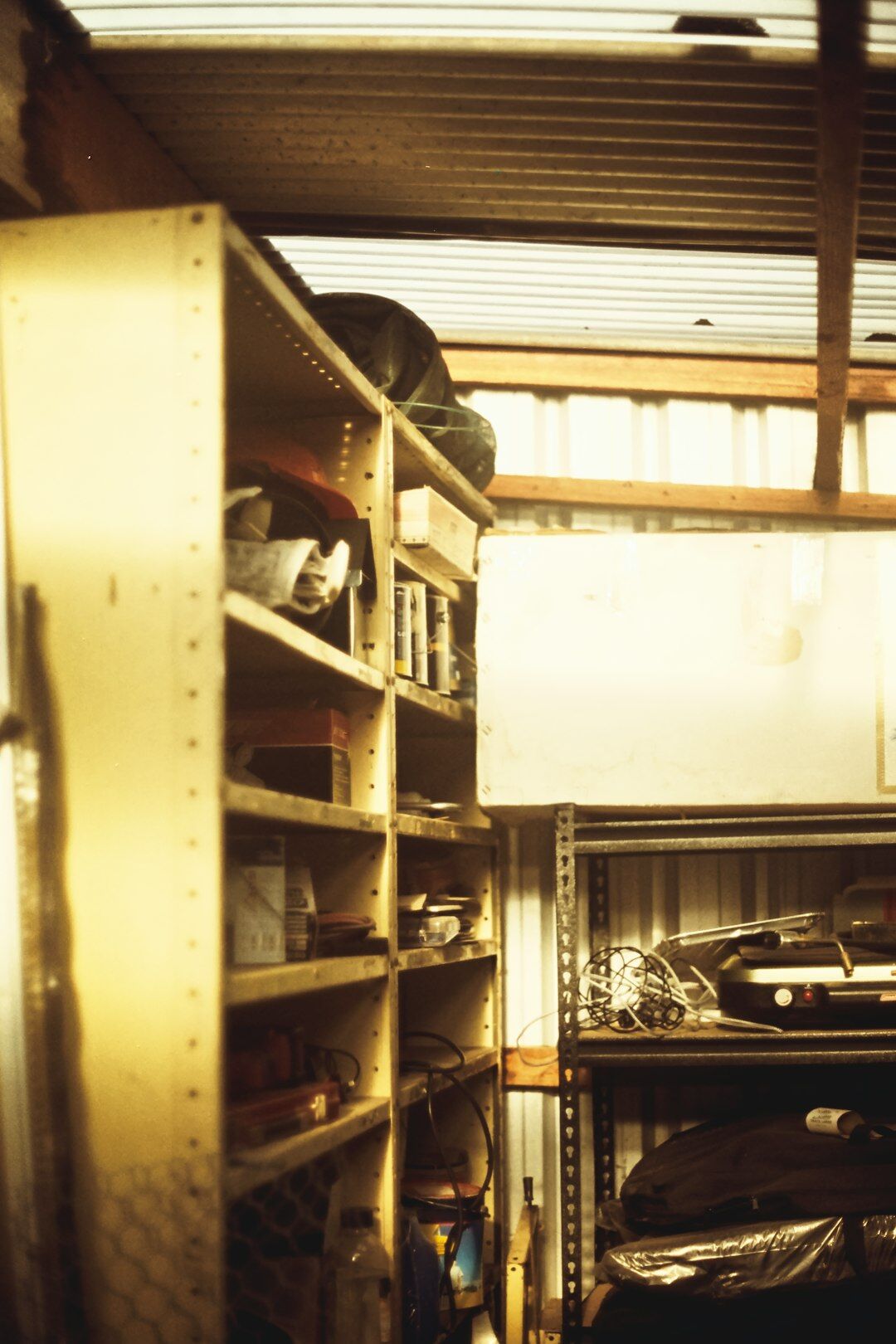 Shelves of archival photographs and automobile documents