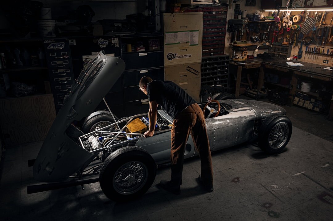 Restoration workshop with a partially restored classic automobile