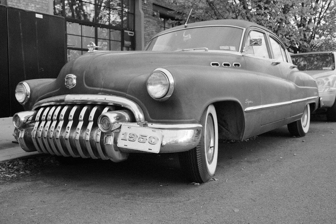 Restored 1950s American automobile with chrome bumpers
